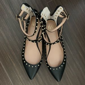 JLO Ayaba black flats with gold studs